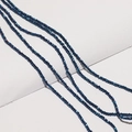 Macro shot of faceted deep blue crystal rondelle beads for DIY jewelry making - Aurora Blue