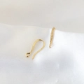 Detailed macro view of 18k gold plated earring hooks with zirconia and textured finish - Fine Beaded Texture Style (6#)