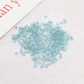 Close-up of 2mm light blue silver-lined glass seed beads for DIY jewelry making - 2 mm / Aqua Blue (4#)