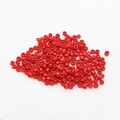 Close-up of premium 2mm red ceramic seed beads for DIY handmade jewelry crafts - 10 g / Red
