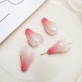 Macro shot of pink and white gradient flower bud pendants for DIY jewelry making - Pink Bud
