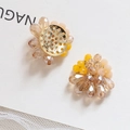 Floral crystal beaded earrings with champagne and gold tones on a white lace card - Khaki
