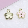 Macro detail of pink enamel flower charms with golden metal texture on the reverse - Light Pink Large