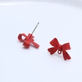 Close-up of red matte bow stud earrings with a small hanging ring for DIY charms - Red Bowknot Earring Stud