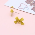 Close-up of matte yellow bow earring studs with DIY hanging loops on pink card - Yellow Bowknot Stud Earrings