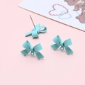 Macro shot of mint green matte bow jewelry components with loop and stud pin detail - Blue-Green Bowknot Earring Stud