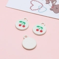 Detail of round alloy pendants with red cherry pattern for DIY jewelry making - Cherry Round Tag