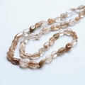 Detailed view of irregular natural rutilated quartz beads on a polished stone chain - 1# Natural Stone / Approx 47 Pcs Per Strand