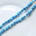 Detail of sky blue heart-shaped ceramic beads for DIY jewelry making on white tray - 11#Sky Blue