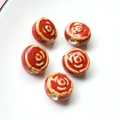 Detailed macro view of five vintage red floral pattern handmade ceramic beads - 5#Red (1 Piece)