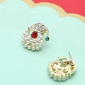 Macro view showing Santa Claus pearl earrings with rhinestone cap and needle back detail - Rhinestone Santa Hat Style