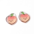 Close-up of translucent pink peach charms with green leaves for DIY jewelry making - 12# Peach