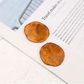 Macro detail of amber resin pendants with marble texture for DIY jewelry making - Irregular Round (Style 1) / Brown & Yellow
