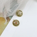 Detailed view of handmade resin flower charms with golden alloy twisted edge frames - Army Green