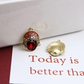 Detailed front and back view of a Peking Opera character alloy pendant with a red gemstone - Beijing Opera Mask Dan Role Style (2# Individual Price)