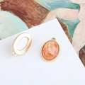Detailed view of oval shell charms and peach resin pendants for DIY jewelry making - Light Pink