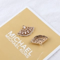 Macro view of two gold plated fan-shaped pendants with white cubic zirconia inlay - 3# Fan Zirconia