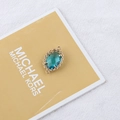 Detailed view of gold plated leaf pendant with blue zircon for DIY jewelry making - 16# Sky Blue Oval Shape