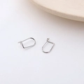 Close-up of minimalist silver U-shaped hook earrings with a polished metallic finish - 6# White K Ear Hooks