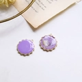 Detailed view of handmade purple resin pendants with gold foil and dried flowers - 5# Purple Round