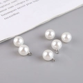 Detailed view of six white faux pearl pendants with silver metal loops for DIY jewelry - Silver Bail 10mm Round Bead (5#) / Pearl White