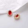 Macro view of vintage gold pendant with red oval crystal and white cubic zirconia detail - Ruby Red / Pendant Only (Without Chain)
