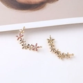 Macro detail of gold-plated flower cluster pendant with red and white cubic zirconia - 1 Piece / Rose Red Zirconia Flower