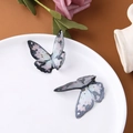 Detailed macro view of gradient purple glue butterfly hair accessories with gold leaf flakes - Large Black-Grey (Large Butterfly No. 2)