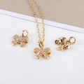 Detailed view of 14K gold plated bow pendants with zircon pave for DIY jewelry making - Bowknot Pendant
