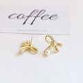 Detailed macro view of gold bow-knot earrings with a white pearl and brushed texture - Brushed Texture Bow Pearl Style (2# Single Price)