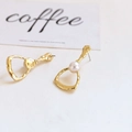 Detailed view of baroque gold-tone hammered metal earrings with central pearl accents - Irregular Geometric Pearl Style (1# Single Price)