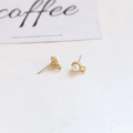Close-up of baroque pearl earring with golden base on a minimalist artistic card - Jagged Base Single Pearl Style (9# Single Price)