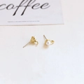 Detail view of Baroque pearl earrings with golden C-shape hooks and silver pins - C-Shaped Hook Linked Pearl Style (10# Single Price)