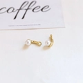 Close-up of J-shaped gold-plated alloy earring charms with pearls for DIY jewelry making - J-Shaped Curved Pearl Finding With Hole (7# Single Price)