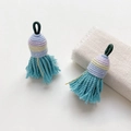 Close-up of ethnic woven tassel pendants in blue and purple for DIY craft accessories - 16# Unit Price