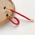 Close-up of handmade red braided cord fasteners with gold thread and wooden button detail - Bright Red Style (#4 Unit Price)