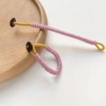Macro view of handmade purple braided rope ring with gold silk thread detail and button - Pink Purple Style (1# Price for Single Item)