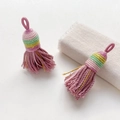 Macro shot of handmade woven purple tassels with colorful silk threads for DIY jewelry - Style 7#