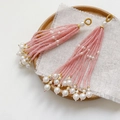 Close-up of handmade pink beaded tassel pendant with pearls and golden accents on linen - Single Piece / 5# Pink