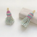 Handmade ethnic woven tassel in macaron pink, blue, and yellow with silver glitter threads - Style 31