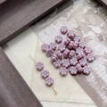 Macro detail of pink glass flower beads with blue edges and golden craft pins - 7# 6-Petal Flower - Pink Purple Blue-Edged