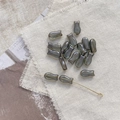 Macro shot of iridescent grey fish-shaped Czech glass beads for DIY jewelry making - 4# Clear Gray Fish Bead