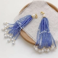 Blue beaded tassel pendant with white faux pearls and golden clasp accessory - Lobster Clasp Style / Dark Blue
