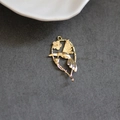 Detailed close-up of a gold-plated hummingbird and flower pendant for DIY jewelry making - Hummingbird Floral Hollow Style (2#)