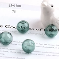 Macro shot of a 15x16mm dark green hollow glass sphere bead for DIY jewelry making - Dark Green Large (7#)