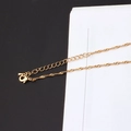 Detailansicht des Karabinerverschlusses und der Verlängerungskette dieser Goldkette - 2# KC Gold (Stil 2)