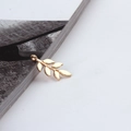 Close-up of golden leaf pendant charm for DIY jewelry making with smooth metallic finish - Leaf Vein Style (8#)
