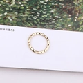 Detailed view of golden metal ring with textured hammered surface on artistic background - Minimalist Hammered Wave Ring (3#)