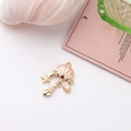 Macro shot of pink enamel shell pendant with starfish charms for DIY jewelry making - Pink Scalloped Tassel Style (Pink #1)