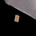 Macro detail of golden rectangular coin pendant with Queen Elizabeth II embossed design - Queen Rectangular Block (4#)